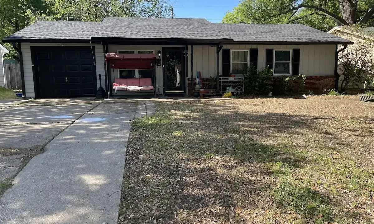 Asphalt Shingle Roof Repair crew at work on a residential roof in Orange City